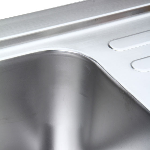 stainless steel sink with 1 right basin +1 left storage surface and splashback