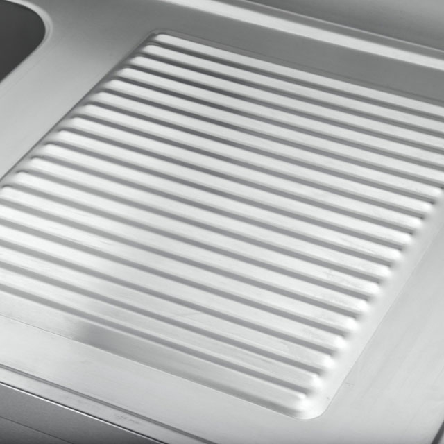 stainless steel sink with 1 right basin +1 left storage surface and splashback