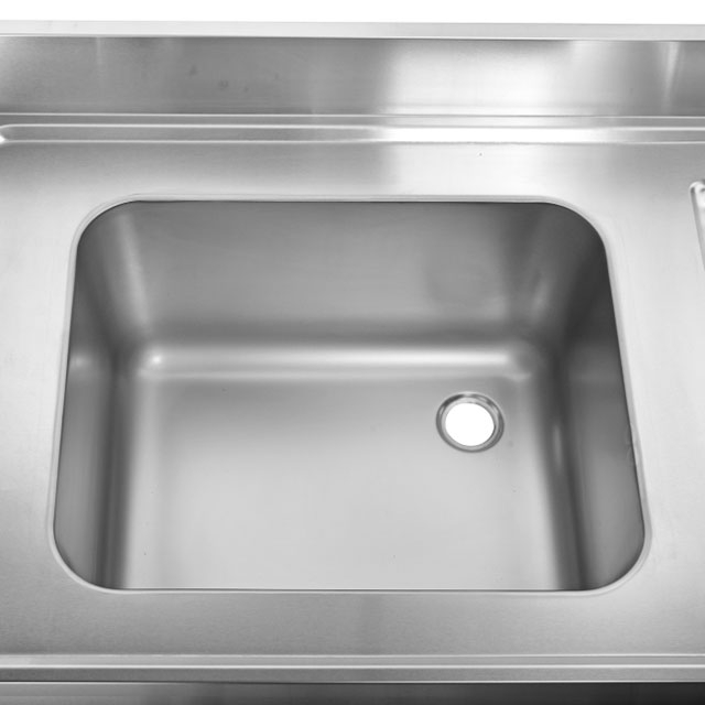 stainless steel sink with 1 right basin +1 left storage surface and splashback